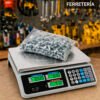 Balanza comercial digital de mostrador pesando tornillos y piezas en ferretería